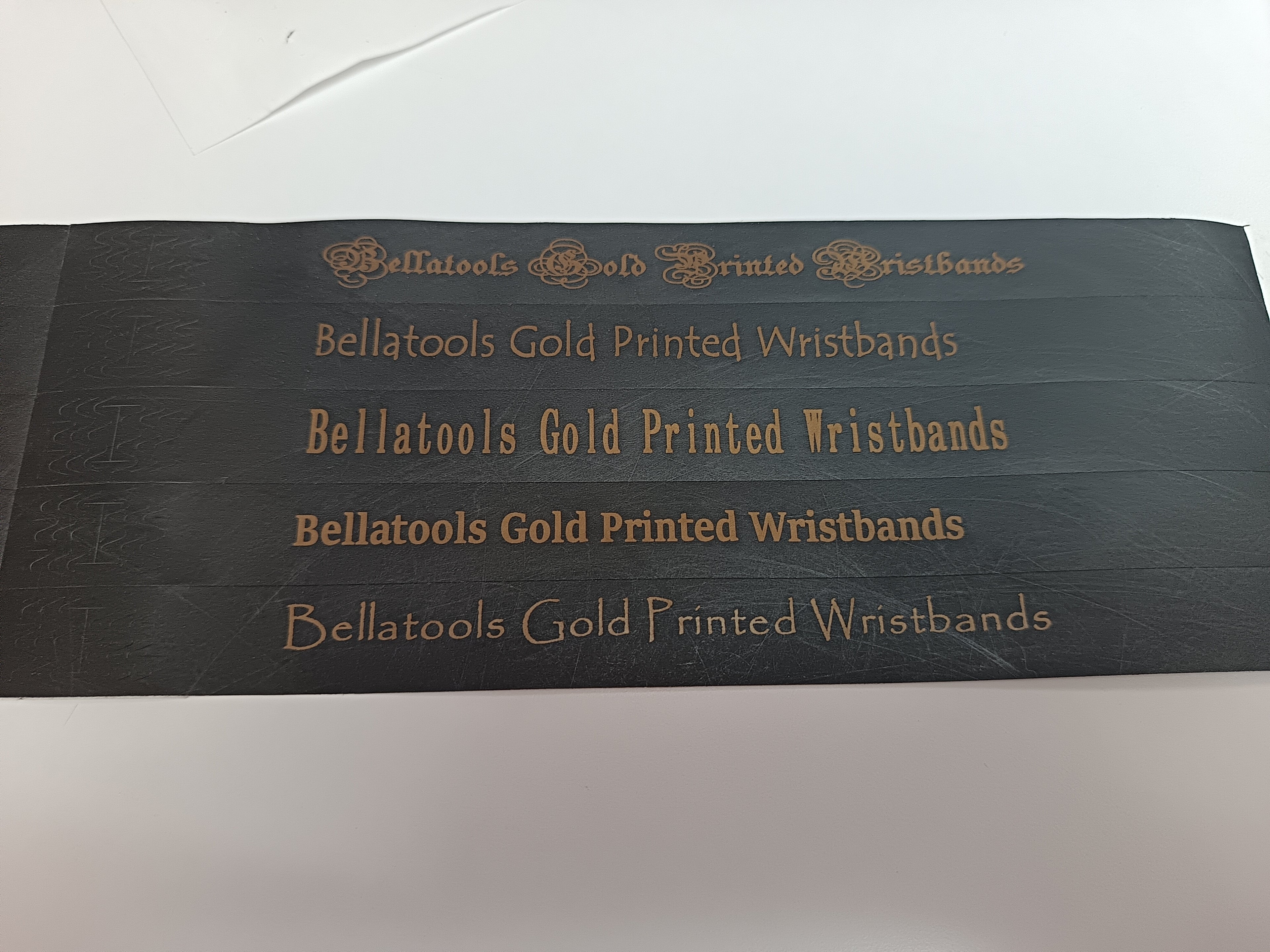 Tyvek Black Bands, Printed in  Gold – Premium Custom Event Bands