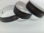 Tyvek Black Bands, Printed in  Gold – Premium Custom Event Bands